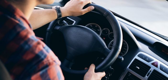 man driving in traffic stress health effects avoided with driver on demand